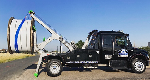 Blue Diamond’s black towing truck.